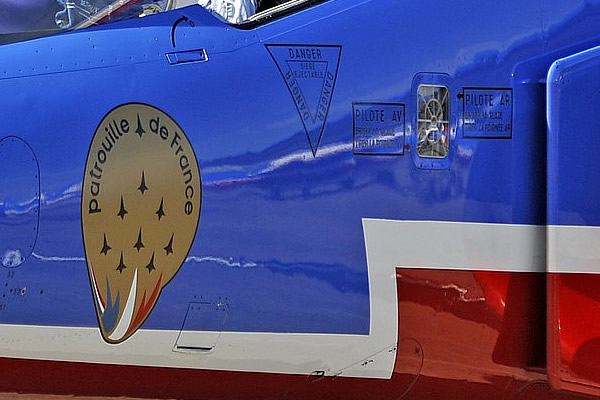 The logo of the Patrouille de France flight demonstration team of the French Air Force The logo of the Patrouille de France flight demonstration team of the French Air Force